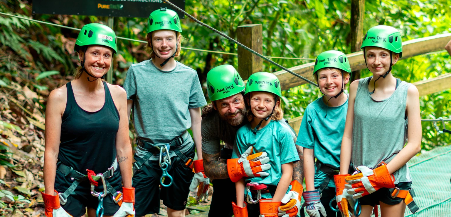 Family enjoying canyoning adventure with Pure Trek in La Fortuna Costa Rica